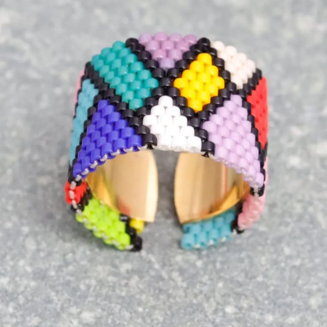Adjustable handmade ring with Miyuki beads and a gold-plated band