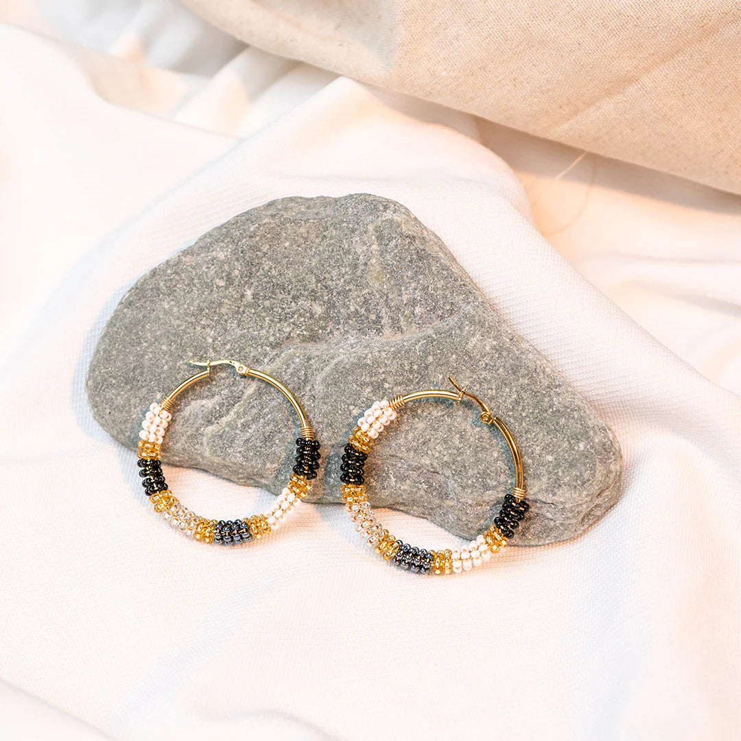 Handmade earrings with beads on wire, featuring a bronze stud with gold plating, available in various colors