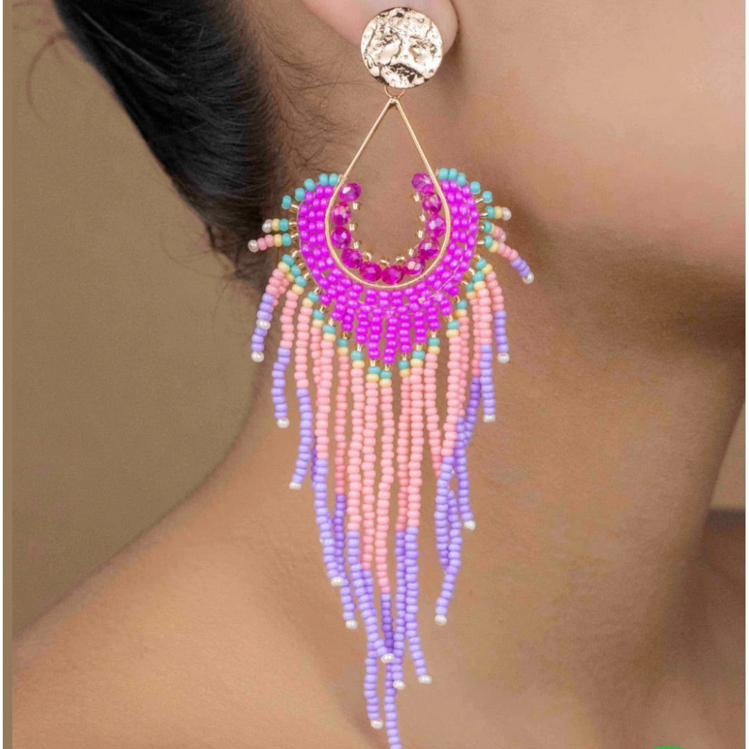 Dangling earrings handmade with beads on wire, featuring a bronze stud with gold plating, available in various colors