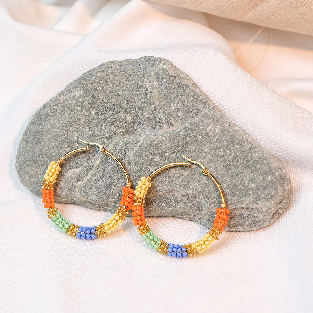 Handmade earrings with beads on wire, featuring a bronze stud with gold plating, available in various colorsHandmade earrings with beads on wire, featuring a bronze stud with gold plating, available in various colors