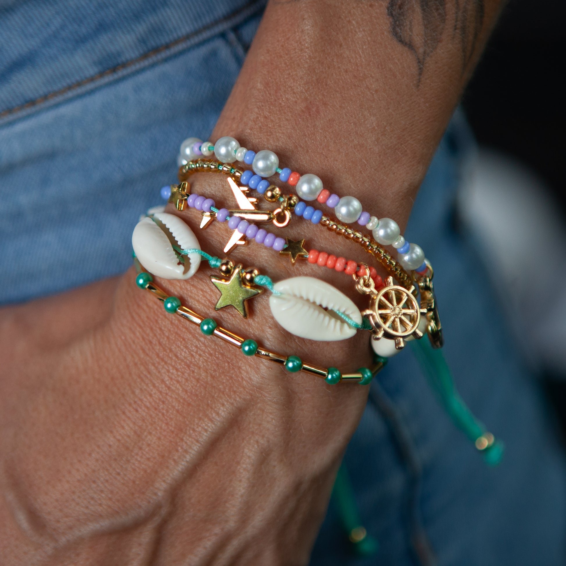 Beautiful Multi-Design Bracelet: Adjustable, Waterproof, Various Designs and Colors The bracelet features over 15 unique designs and colors to choose from. It is also waterproof and adjustable for a comfortable fit that will last over time. With a variety of options, this bracelet is perfect for any style or occasion.