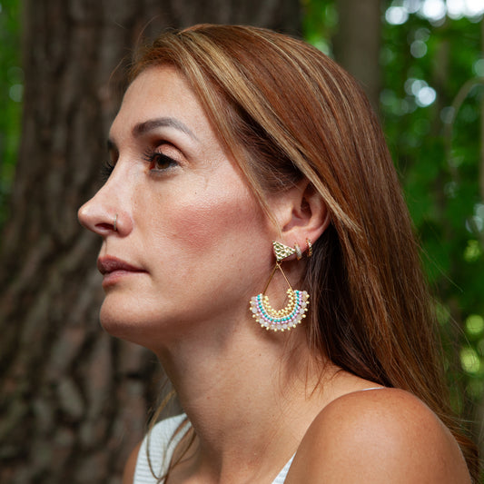 Each pair features unique beadwork and a bronze stud with gold plating, available in an array of stunning colors. Elevate your style with our Fan-Shaped Earrings.